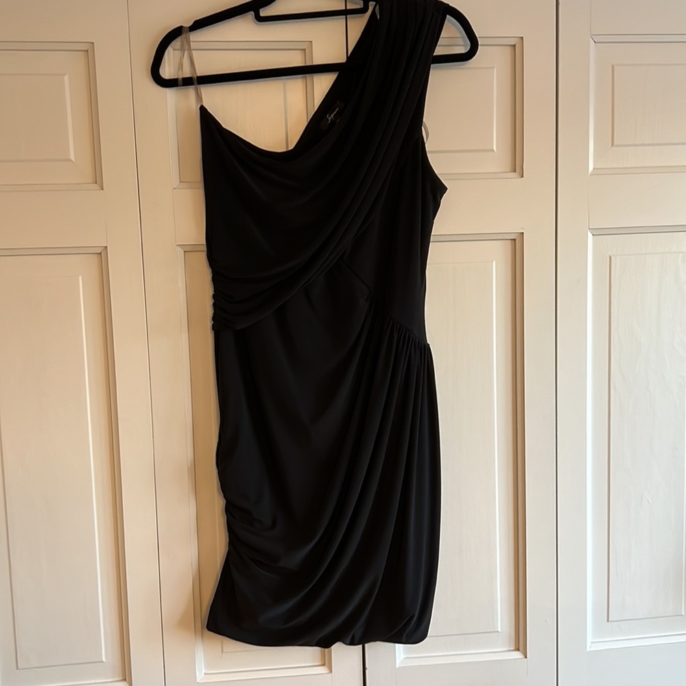 One shoulder very flattering cocktail dress that drapes in all the right places.